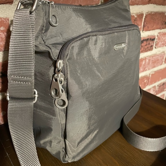 Baggallino Crossbody Bag. Color-taupe. Zipper closures, adj strap. Nylon/Poly. - Picture 4 of 10